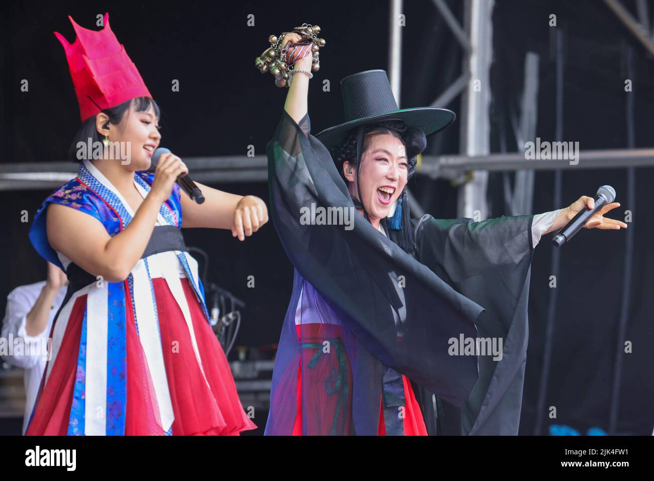Malmesbury, Wiltshire, UK. 30th July 2022, Womad Festival, Charlton Park, Malmesbury, Wiltshire.  Korean folk-pop band ADG7 perform on the Open Air Stage.  The WOMAD Festival held its first event in 1982 at the Bath and West Showground in Shepton Mallet, Somerset. Over the intervening 40 years, the Peter Gabriel fronted organisation has hosted festivals across the globe, from Spain to New Zealand, Chile to Abu Dhabi. For the 40th anniversary its flagship UK festival is held this weekend from 28-30 July at Charlton Park. WOMAD - World of Music, Arts and Dance. Credit: Casper Farrell Photography Stock Photo