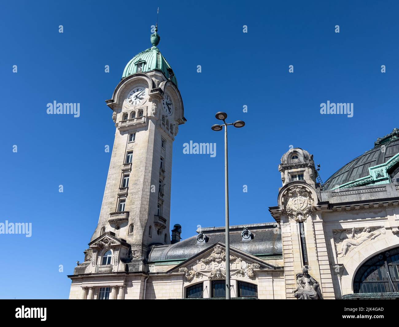 Gare de Limoges-Bénédictins with distinctive dome and tower, blue sky Stock Photo