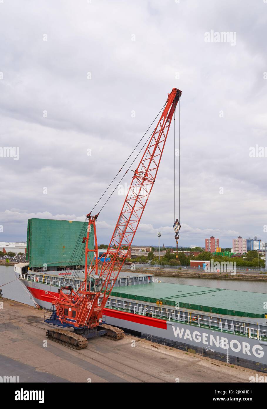 Dock crane next to a bulk carrier cargo ship in Hull docks, Yorkshire, UK Stock Photo Alamy