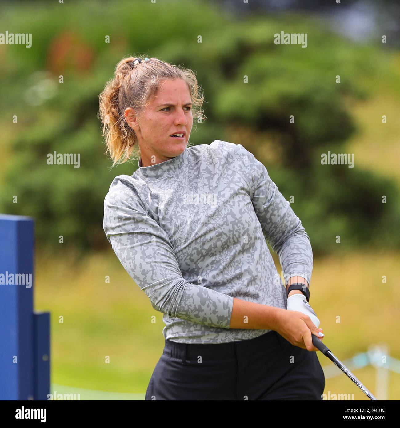 Irvine, UK. 30th July, 2022. The third round of the Trust Golf Women's Scottish Golf took place with 75 players making the cut. Heavy overnight rain from Friday into Saturday made for a softer and more testing course. Leonie Harm teeing off at the 9th. Credit: Findlay/Alamy Live News Stock Photo