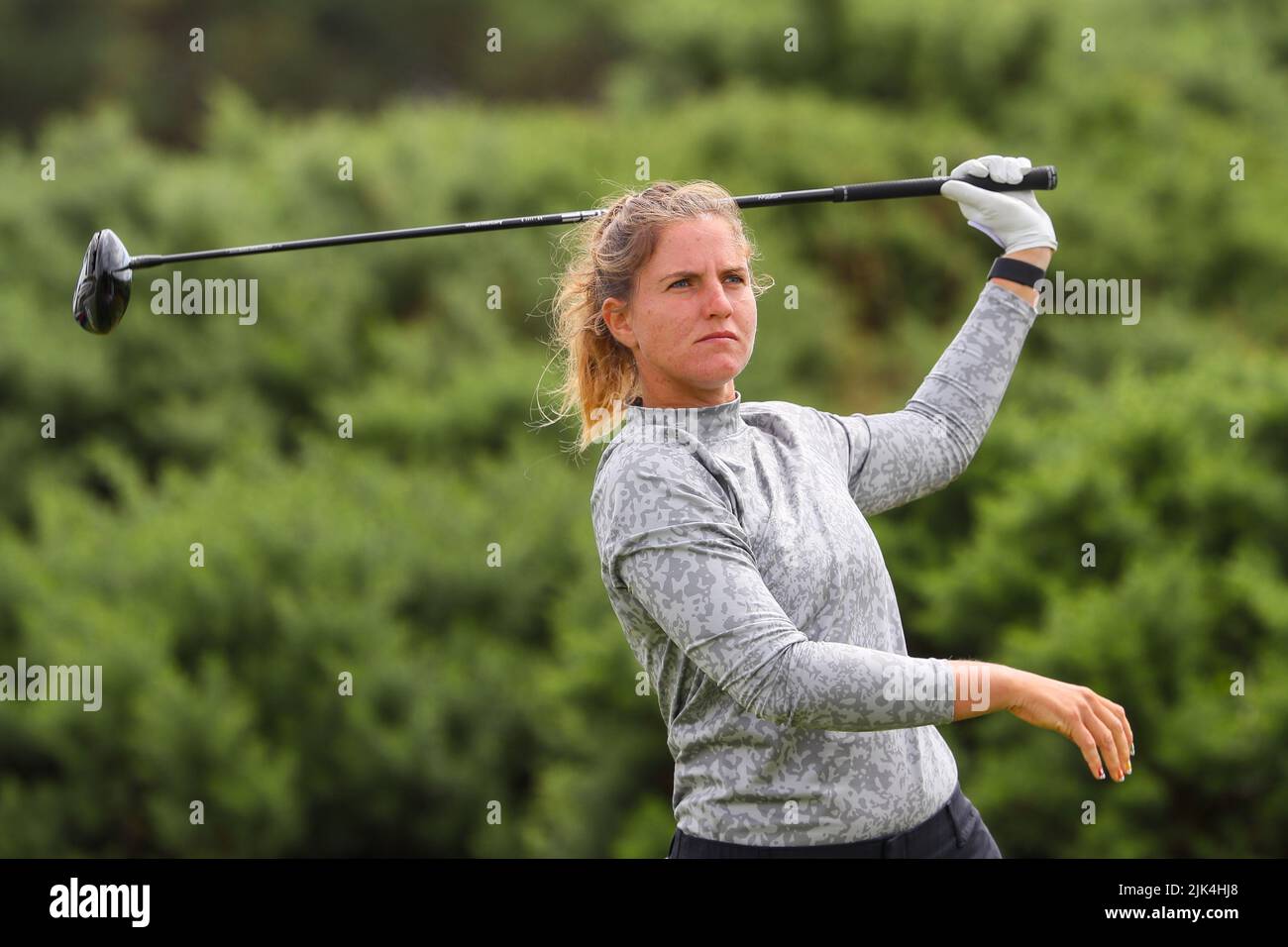 Irvine, UK. 30th July, 2022. The third round of the Trust Golf Women's Scottish Golf took place with 75 players making the cut. Heavy overnight rain from Friday into Saturday made for a softer and more testing course. Leonie Harm teeing off at the 9th. Credit: Findlay/Alamy Live News Stock Photo