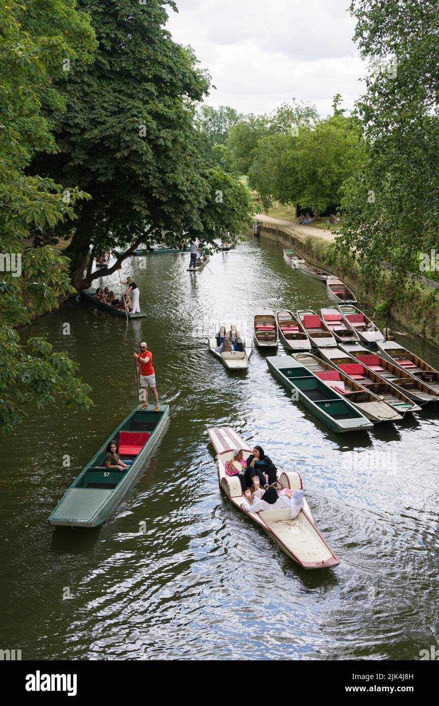 People on punts and pedalos on the river Cherwell by Magdelan Bridge Boathouse, Oxford, UK Stock Photo