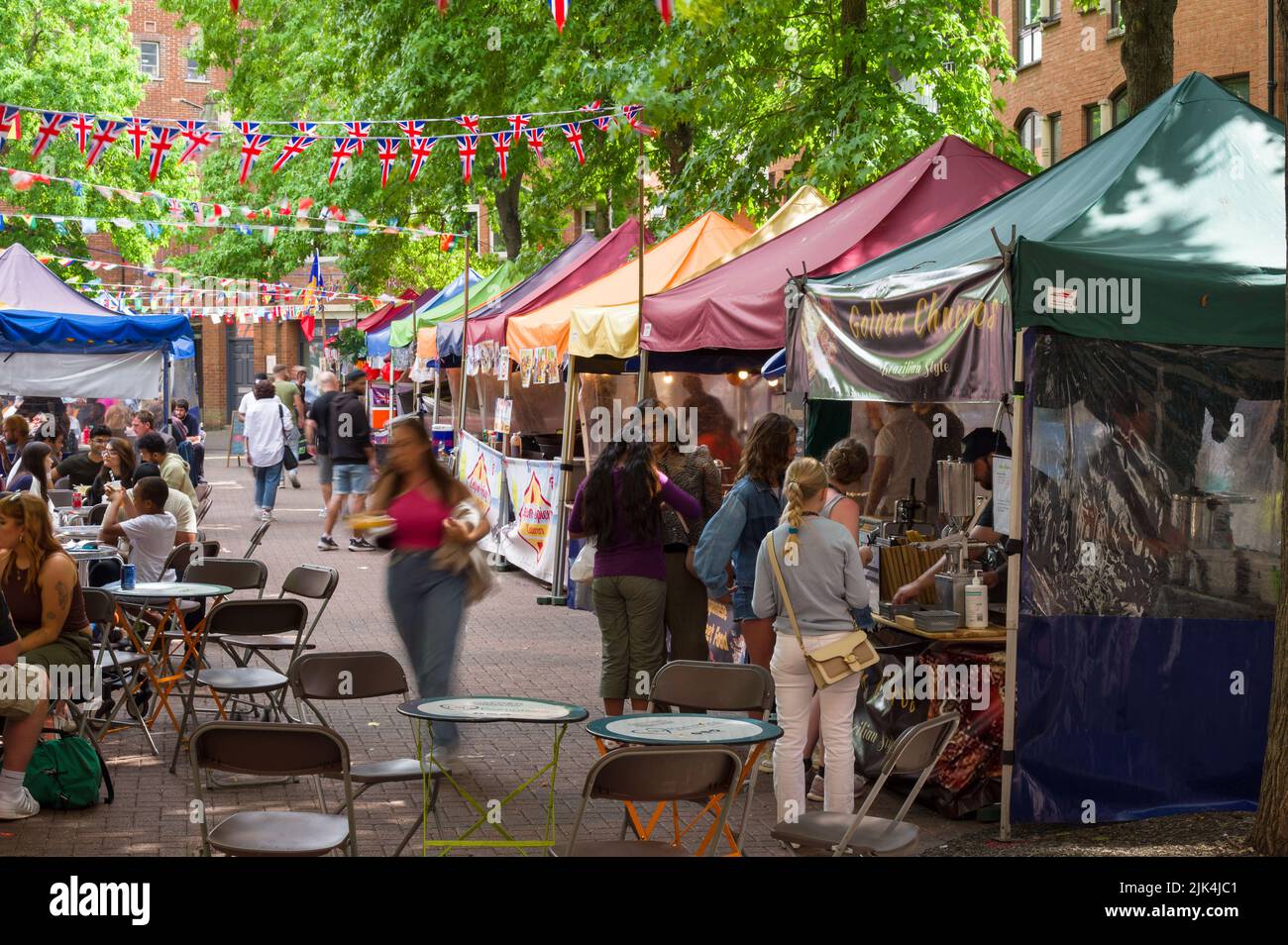 Gloucester Green Town Square with market stalls and people walking around, Oxford, UK Stock