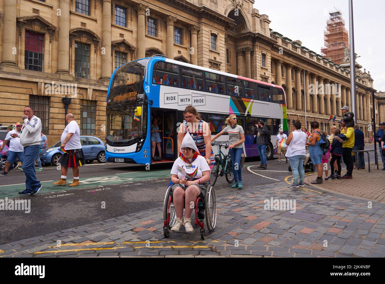 Disabled girl in a wheelchair on a Gay Pride march in Hull, Yorkshire
