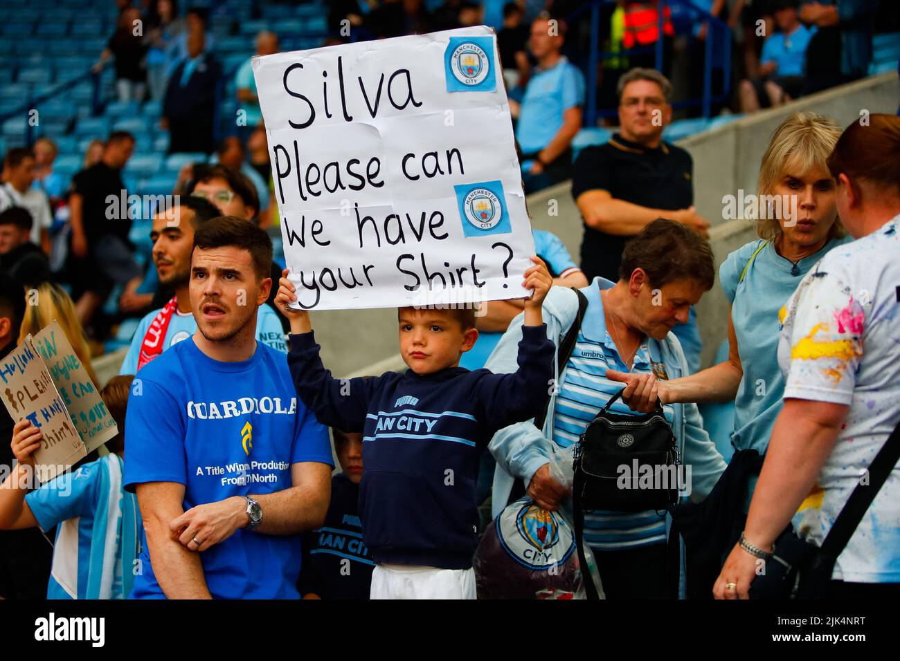 Leicester, UK. 30th July 2022; The King Power Stadium, Leicester, Leicestershire, England;  FA Community Shield, Liverpool versus Manchester City; A young Manchester City fan holds a sign asking for Bernado Silva&#x2019;s shirt Credit: Action Plus Sports Images/Alamy Live News Stock Photo