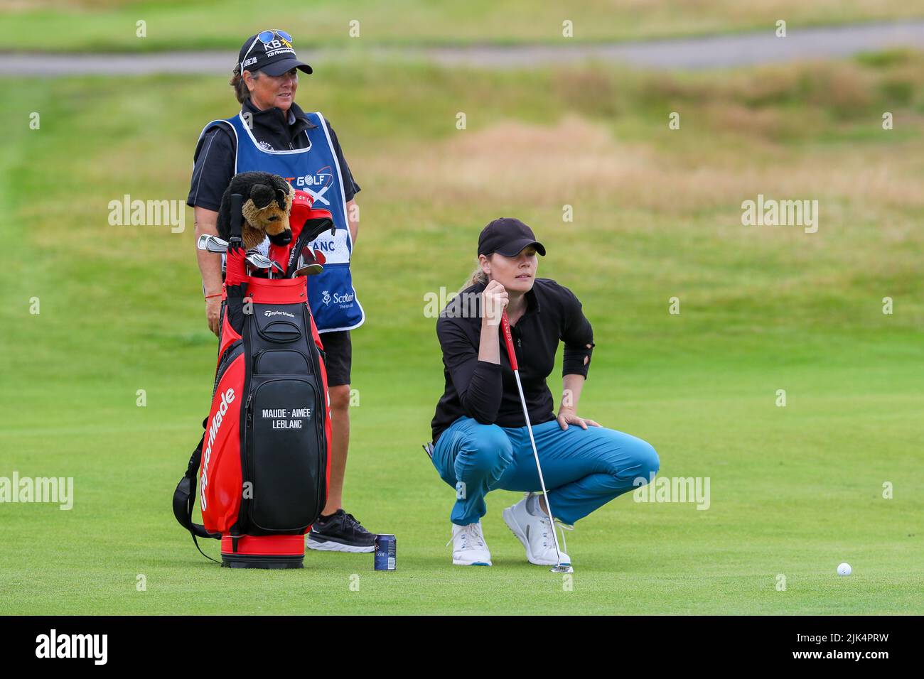 Irvine, UK. 30th July, 2022. The third round of the Trust Golf Women's Scottish Golf took place with 75 players making the cut. Heavy overnight rain from Friday into Saturday made for a softer and more testing course. Maaude Aimee Leblanc putting at the 4th. Credit: Findlay/Alamy Live News Stock Photo