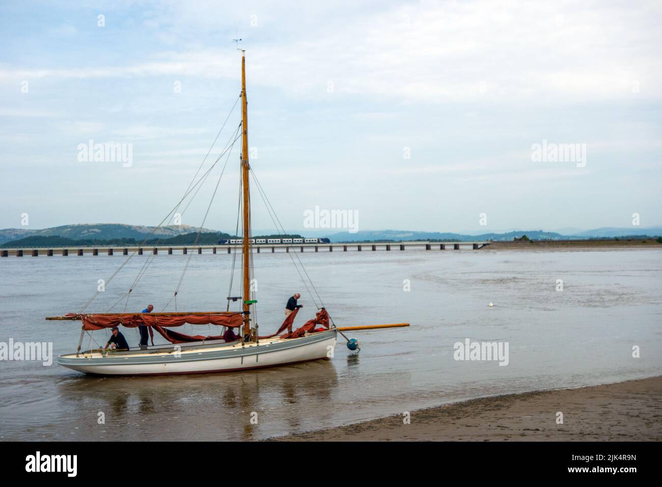 Siling boat in the Kent estuary on the river Kent at Arnside Cumbria Stock Photo