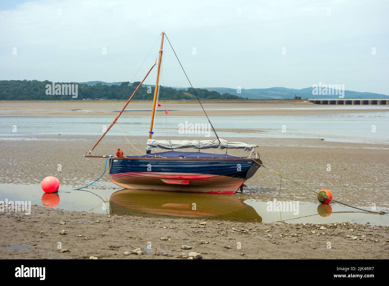 Siling boat in the Kent estuary on the river Kent at Arnside Cumbria Stock Photo