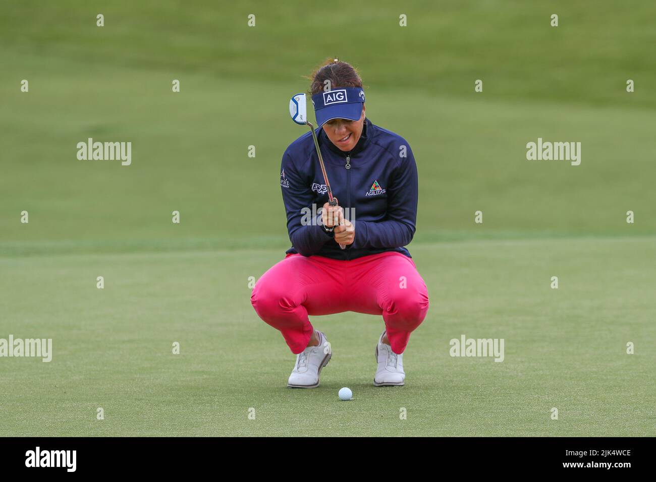 Irvine, UK. 30th July, 2022. The third round of the Trust Golf Women's Scottish Golf took place with 75 players making the cut. Heavy overnight rain from Friday into Saturday made for a softer and more testing course. Georgia Hall lining up her putt on the second green. Credit: Findlay/Alamy Live News Stock Photo