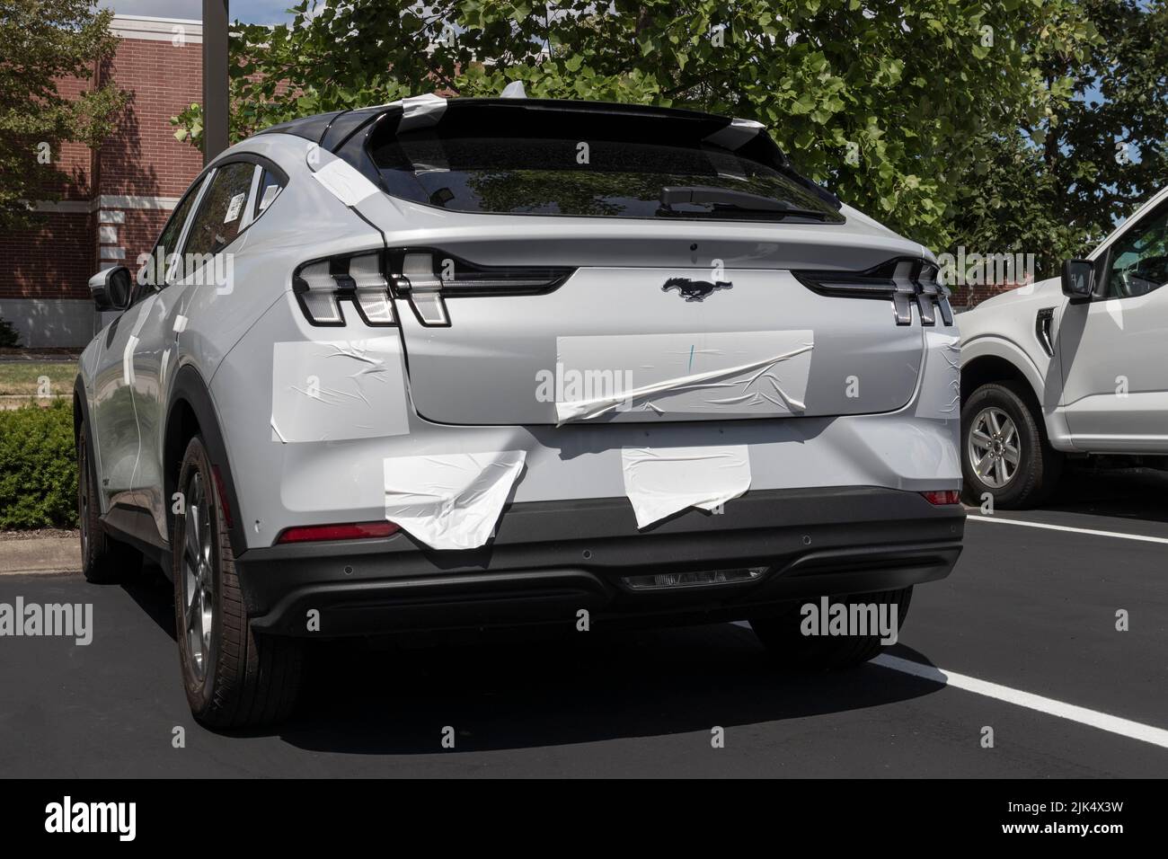 Zionsville - Circa July 2022: Ford Mustang Mach-E SUV display. The Mustang Mach-E is Ford's first all-electric crossover and has a range of up to 300 Stock Photo
