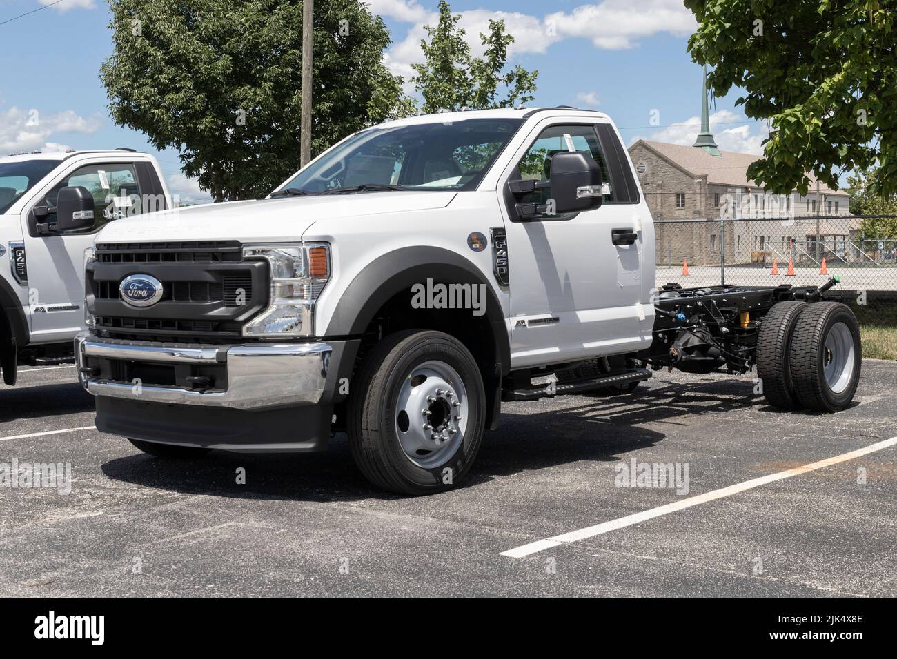 Indianapolis - Circa July 2022: Ford F-450 display at a dealership. The F450 is available in Chassis Cab, Flatbed and Dump Truck models. Stock Photo