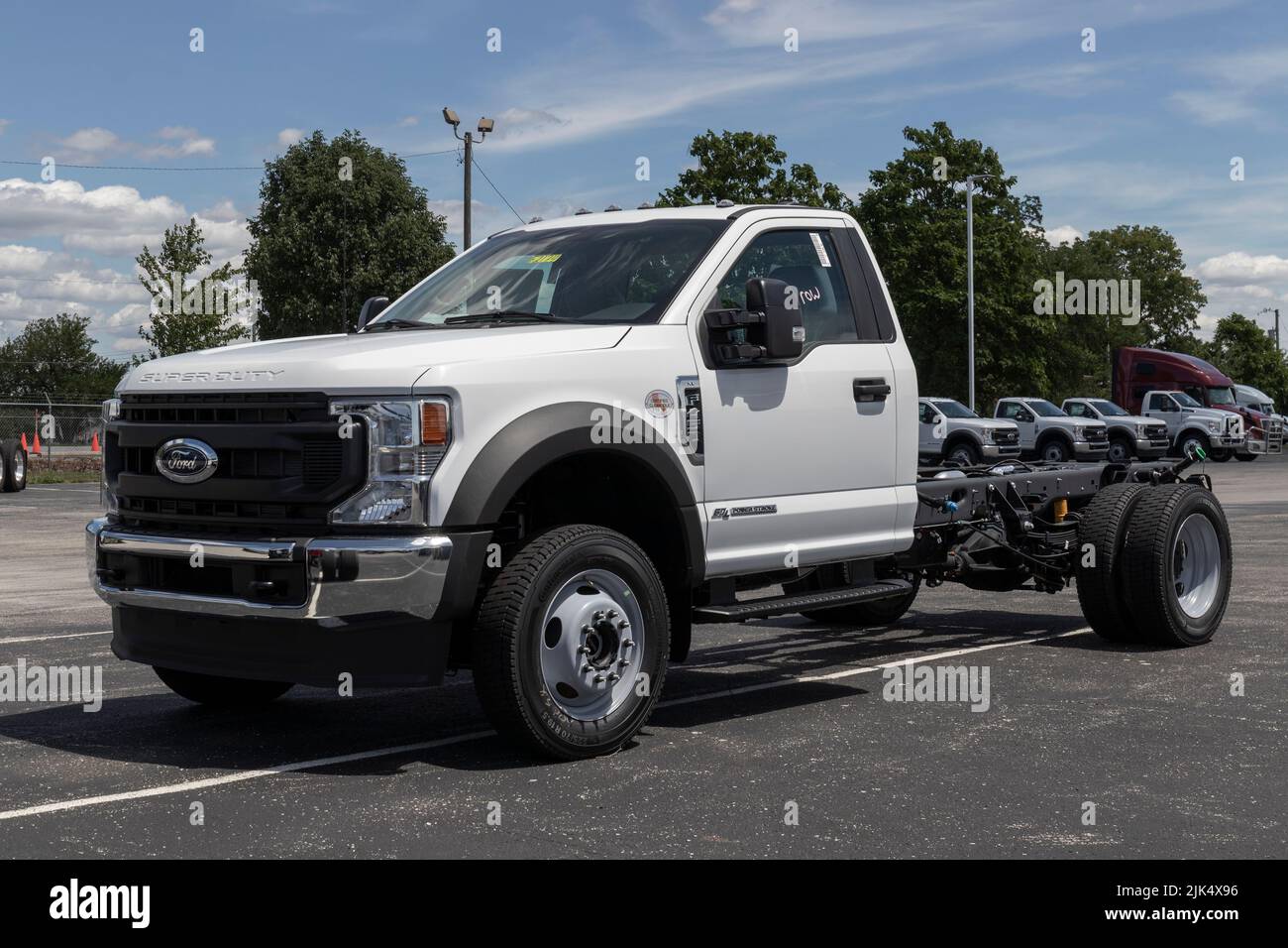 Indianapolis - Circa July 2022: Ford F-450 display at a dealership. The F450 is available in Chassis Cab, Flatbed and Dump Truck models. Stock Photo