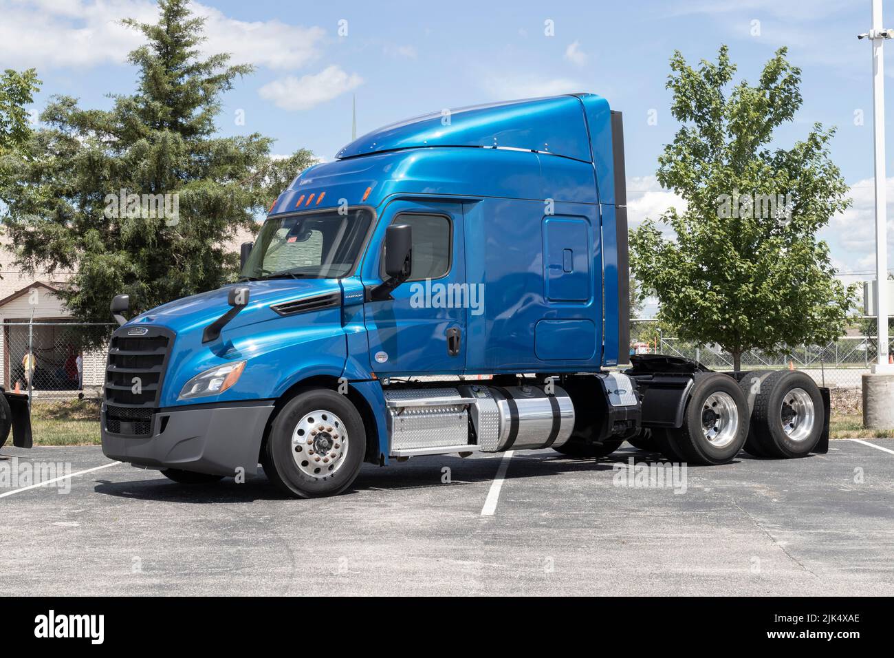 Indianapolis - Circa July 2022: Freightliner Semi Tractor Trailer Trucks Lined up for sale. Freightliner is owned by Daimler. Stock Photo