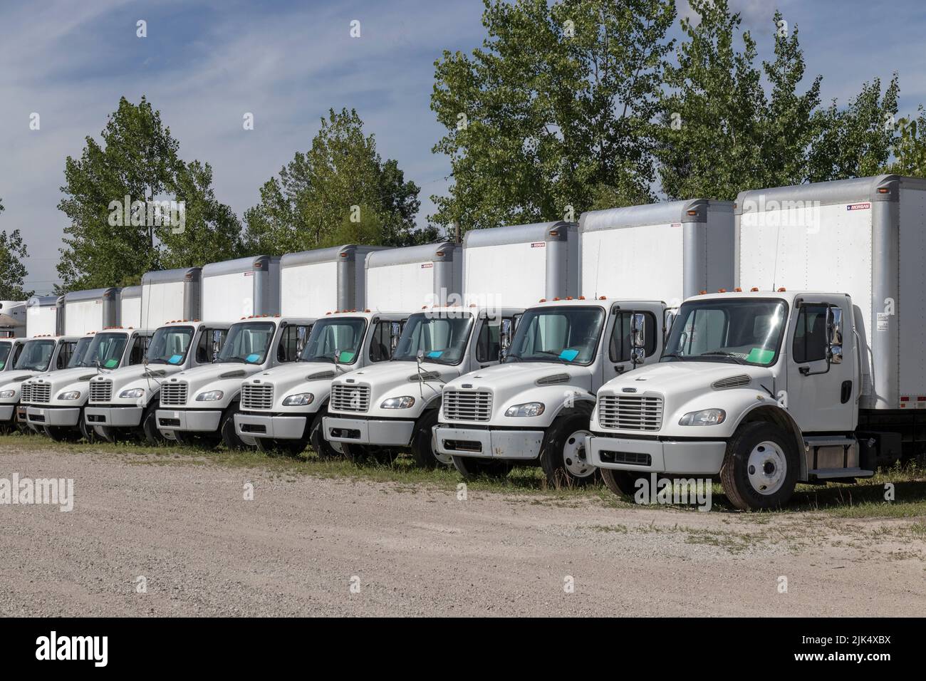 Indianapolis - Circa July 2022: Freightliner Semi Tractor Trailer Trucks Lined up for sale. Freightliner is owned by Daimler. Stock Photo