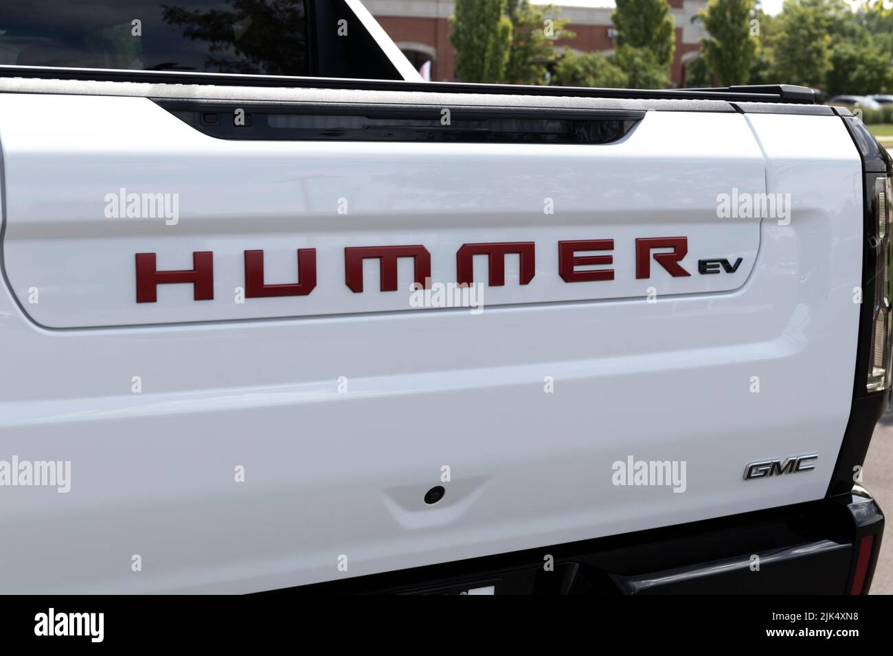 Carmel - Circa July 2022: GMC Hummer EV Sport Utility Truck display. The GMC Hummer EV is offered in EV2, EV2x, and EV3x models. Stock Photo