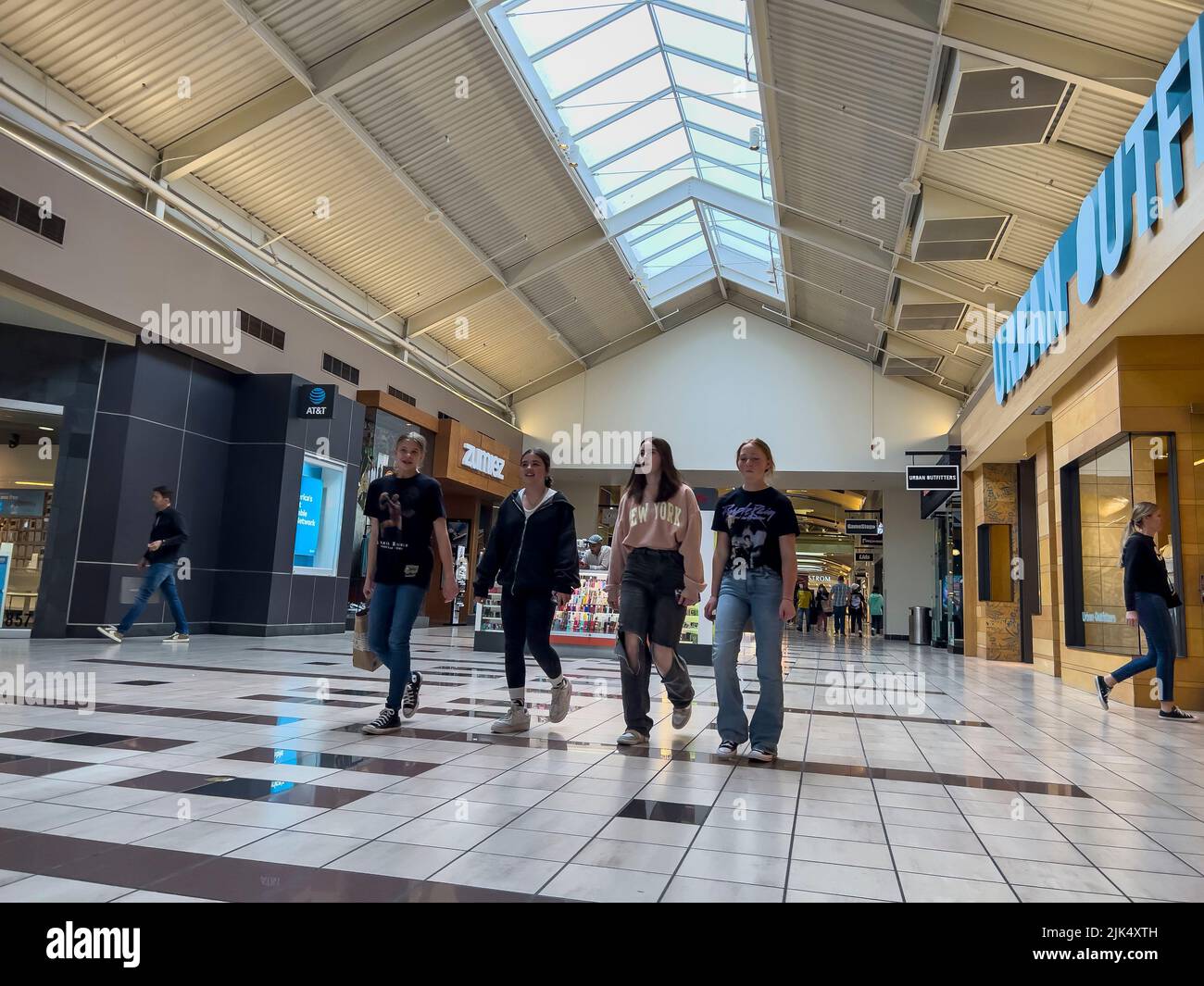 Lynnwood, WA USA - circa June 2022: Wide angle view of people shopping inside the Alderwood Mall. Stock Photo