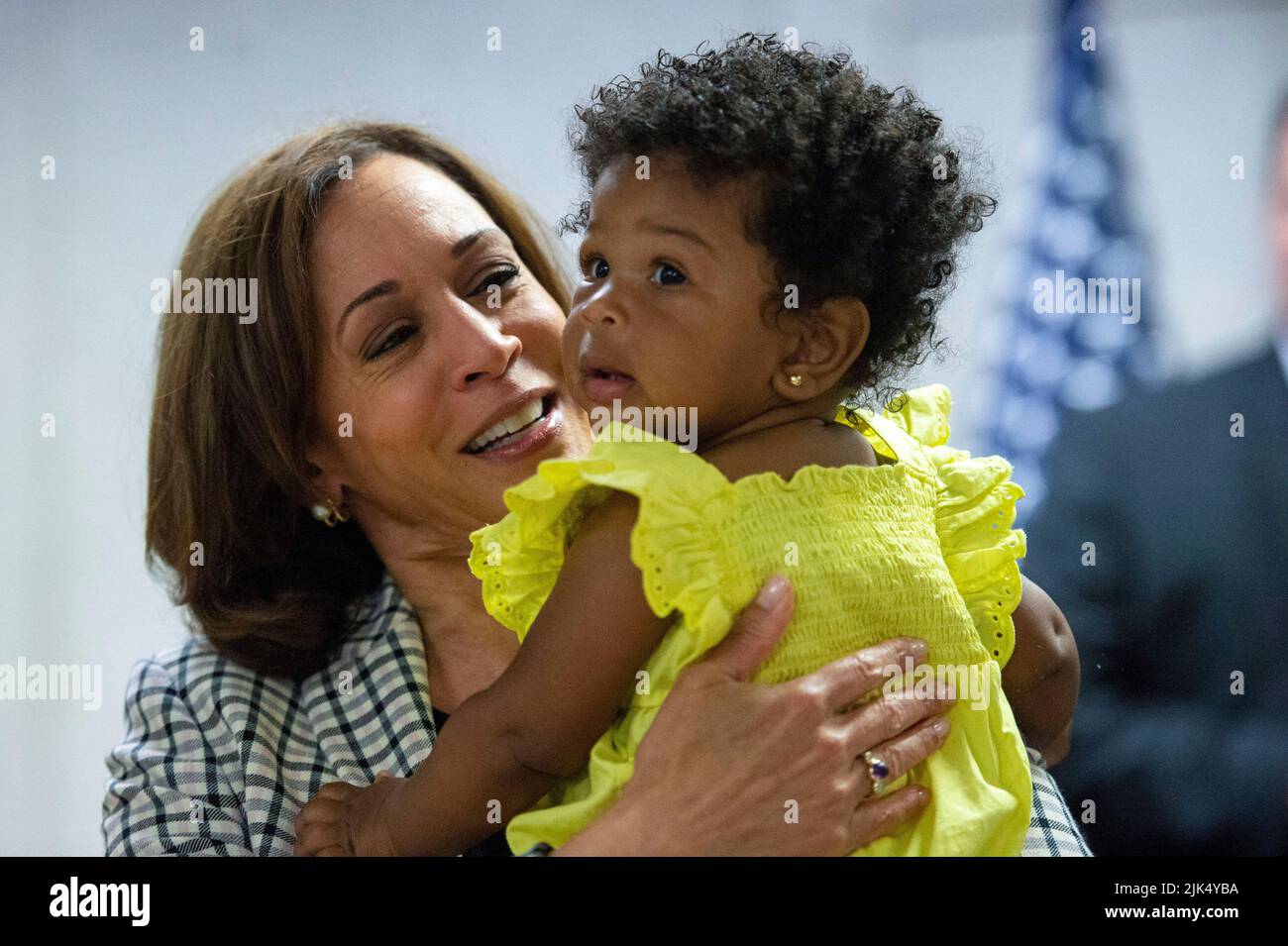 U.S. Vice President Kamala Harris holds a baby after speaking with Democratic National Committee staff and volunteers to commemorate 100 days from the midterms on Saturday, July 30, 2022 in Washington, DC. (Photo by Bonnie Cash/Pool/ABACAPRESS.COM) Stock Photo