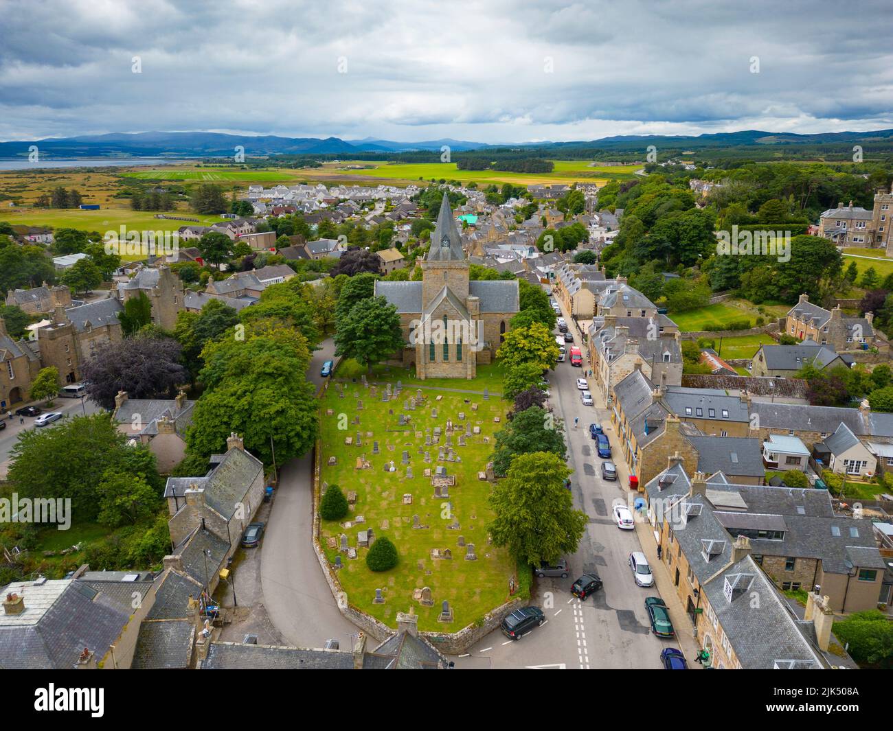 Aerial view of centre of Dornoch town and Dornoch Cathedral in