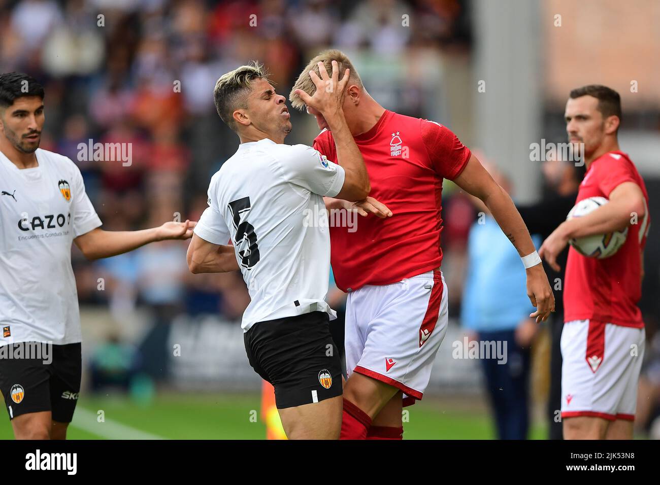 Tempers heat up between Gabriel Paulista of Valencia and Sam Surrage of Nottingham Forest during the Pre-season Friendly match between Nottingham Forest and Valencia CF at Meadow Lane, Nottingham on Saturday 30th July 2022. (Credit: Jon Hobley | MI News) Credit: MI News & Sport /Alamy Live News Stock Photo