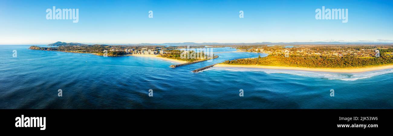 forster Tuncurry towns waterfront from Pacific ocean around Wallis lake Coolongolook river mouth - aerial panorama. Stock Photo