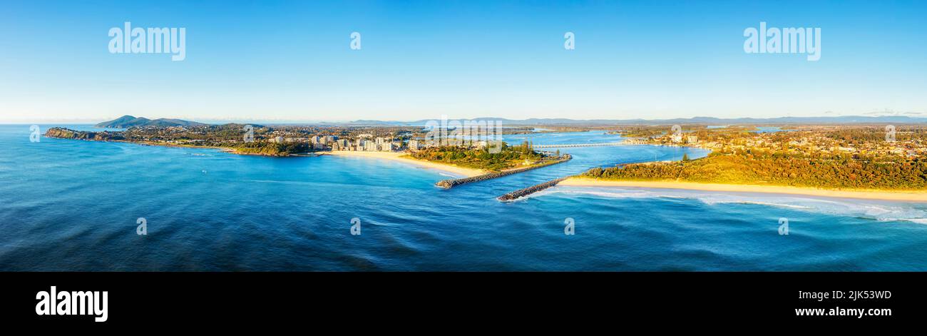 Scenici Forster-Tuncurry towns waterfront from Pacific ocean around Wallis lake Coolongolook river mouth - aerial panorama. Stock Photo