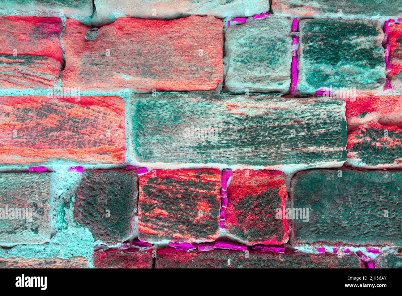Vibrant colored bricks background . Old stone wall texture Stock Photo