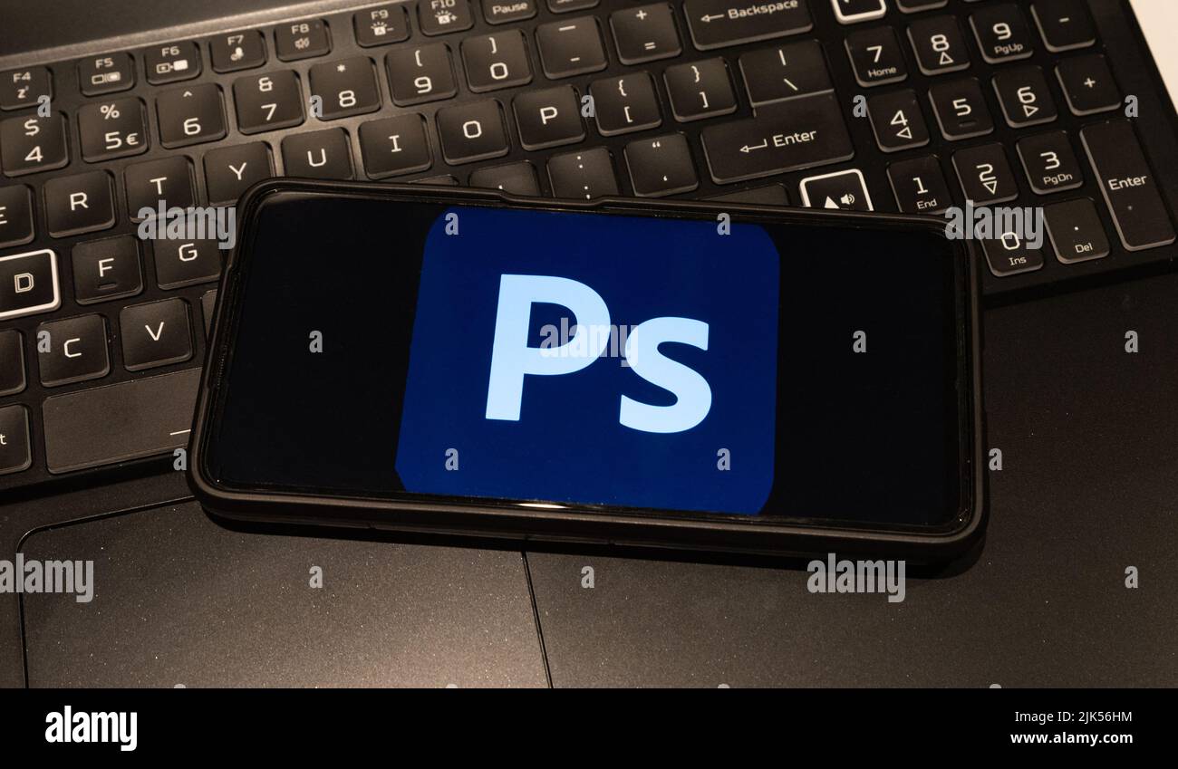Photoshop logo on mobile phone  , background is a keyboard  , Sydney Australia July 30 2022 Stock Photo