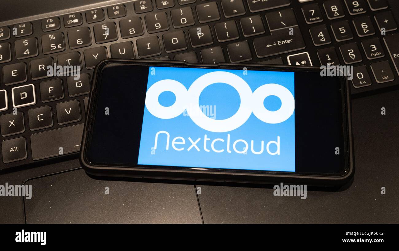 nextcloud logo on mobile phone  , background is a keyboard  , Sydney Australia July 30 2022 Stock Photo