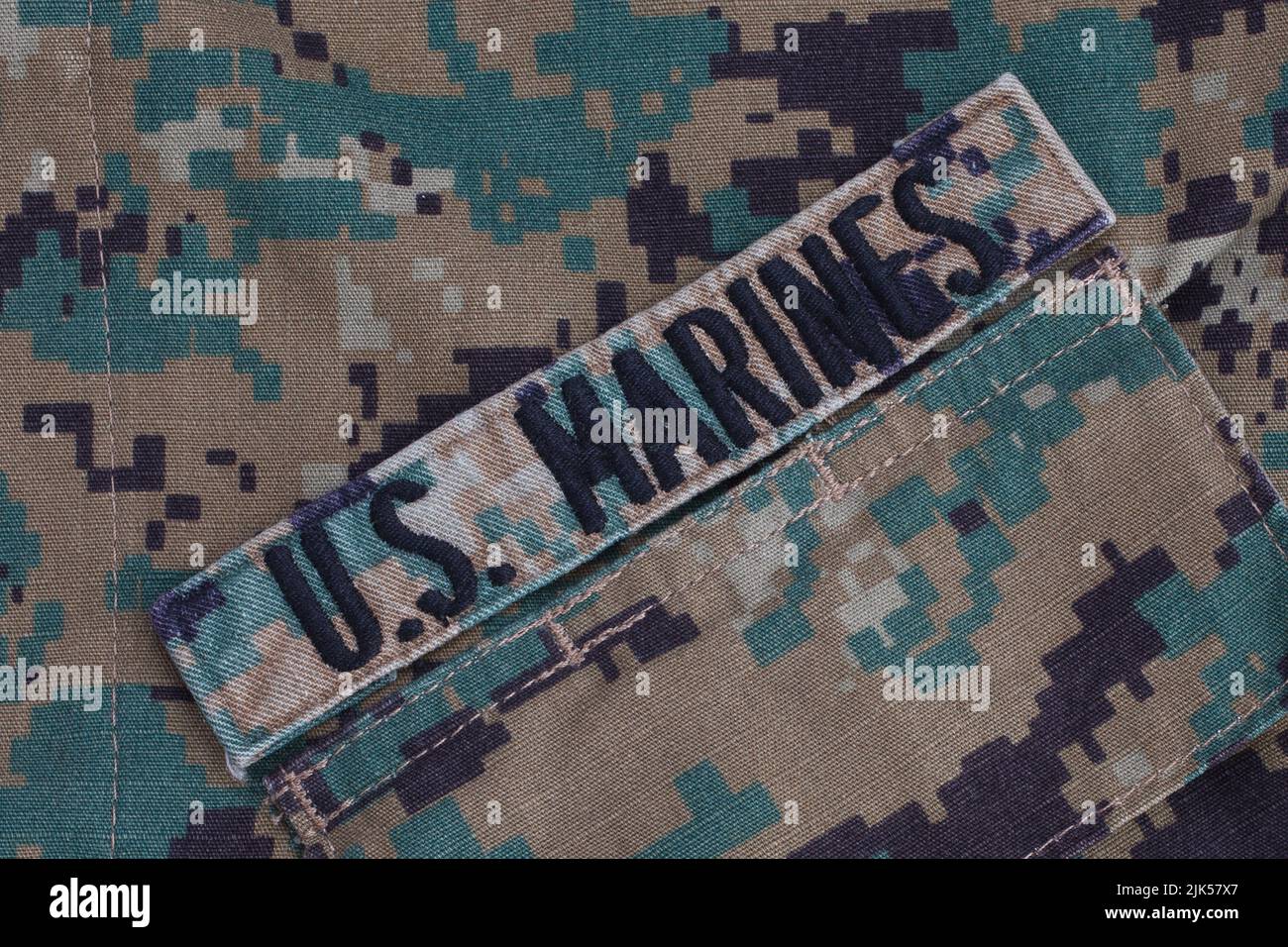 KYIV, UKRAINE - October 20, 2016. U.S. MARINES branch tape with camouflage uniform Stock Photo