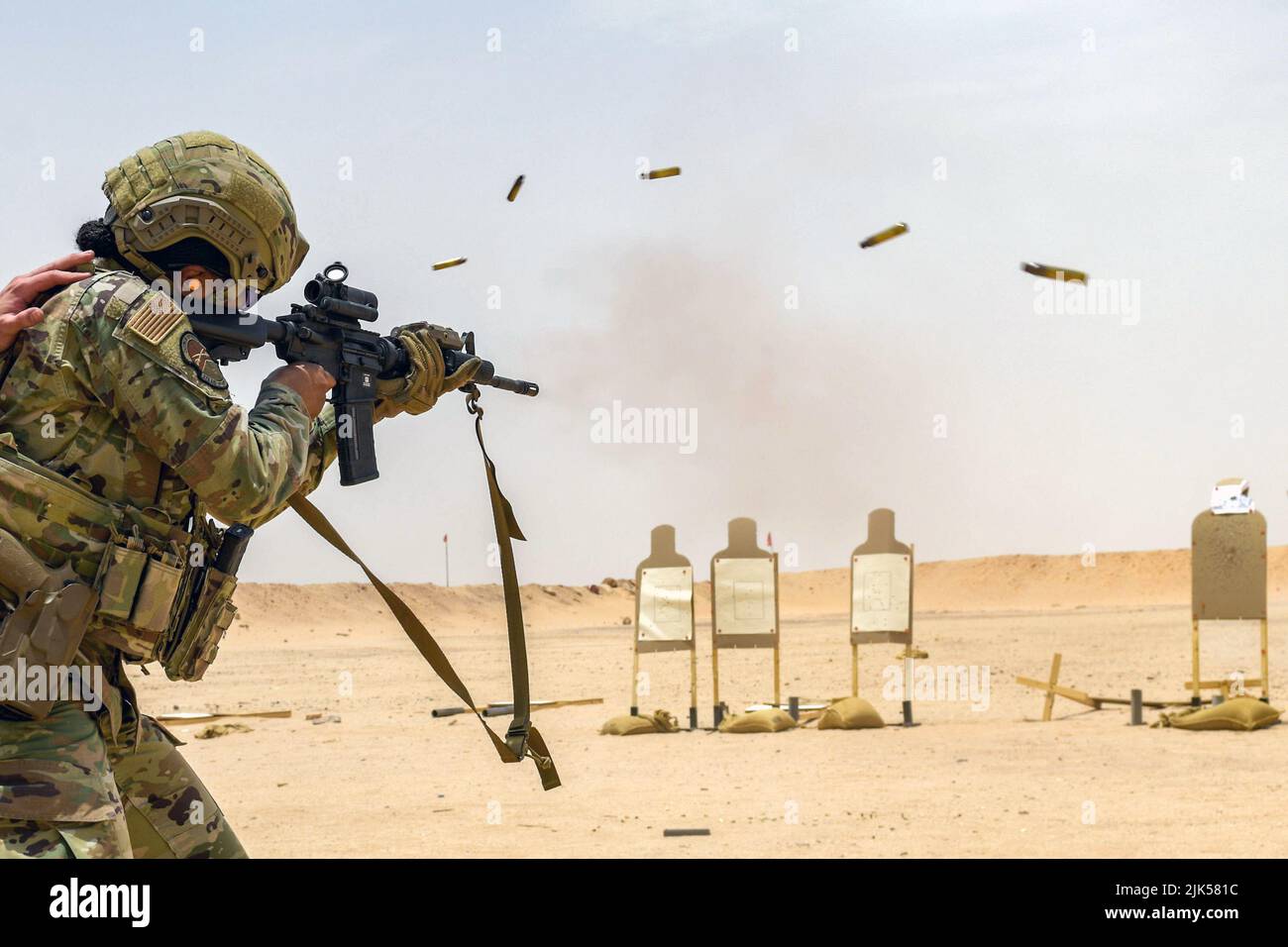 Prince Sultan Air Base, Saudi Arabia. 8th July, 2022. U.S. Air Force Master Sgt. Kourtney Haggins, 378th Expeditionary Security Forces Squadron first sergeant, fires an M4 carbine on full auto at Prince Sultan Air Base's firing range, Kingdom of Saudi Arabia, July 8, 2022. The 378th ESFS invited the 378th Air Expeditionary Wing leadership out to see some of the squadron's equipment and feel its capabilities firsthand. Credit: U.S. Air Force/ZUMA Press Wire Service/ZUMAPRESS.com/Alamy Live News Stock Photo