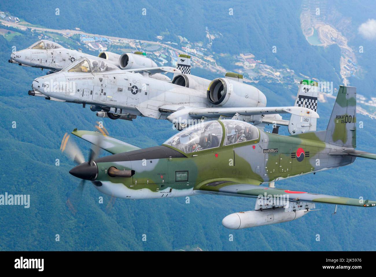 Osan Air Base, South Korea. 12th July, 2022. A Republic of Korea Air Force KA-1 Woongbi assigned to the 237th Fighter Squadron flies alongside two 25th Fighter Squadron A-10 Thunderbolt IIs during Buddy Squadron 22-5 July 12, at Wonju Air Base, Republic of Korea. BS 22-5 is a bilateral training event for pilots, maintenance technicians and support personnel to build trust, introduce new tactics and exchange ideas. The exercise was the first of its kind since the start of the COVID-19 pandemic. Credit: ROKAF/ZUMA Press Wire Service/ZUMAPRESS.com/Alamy Live News Stock Photo