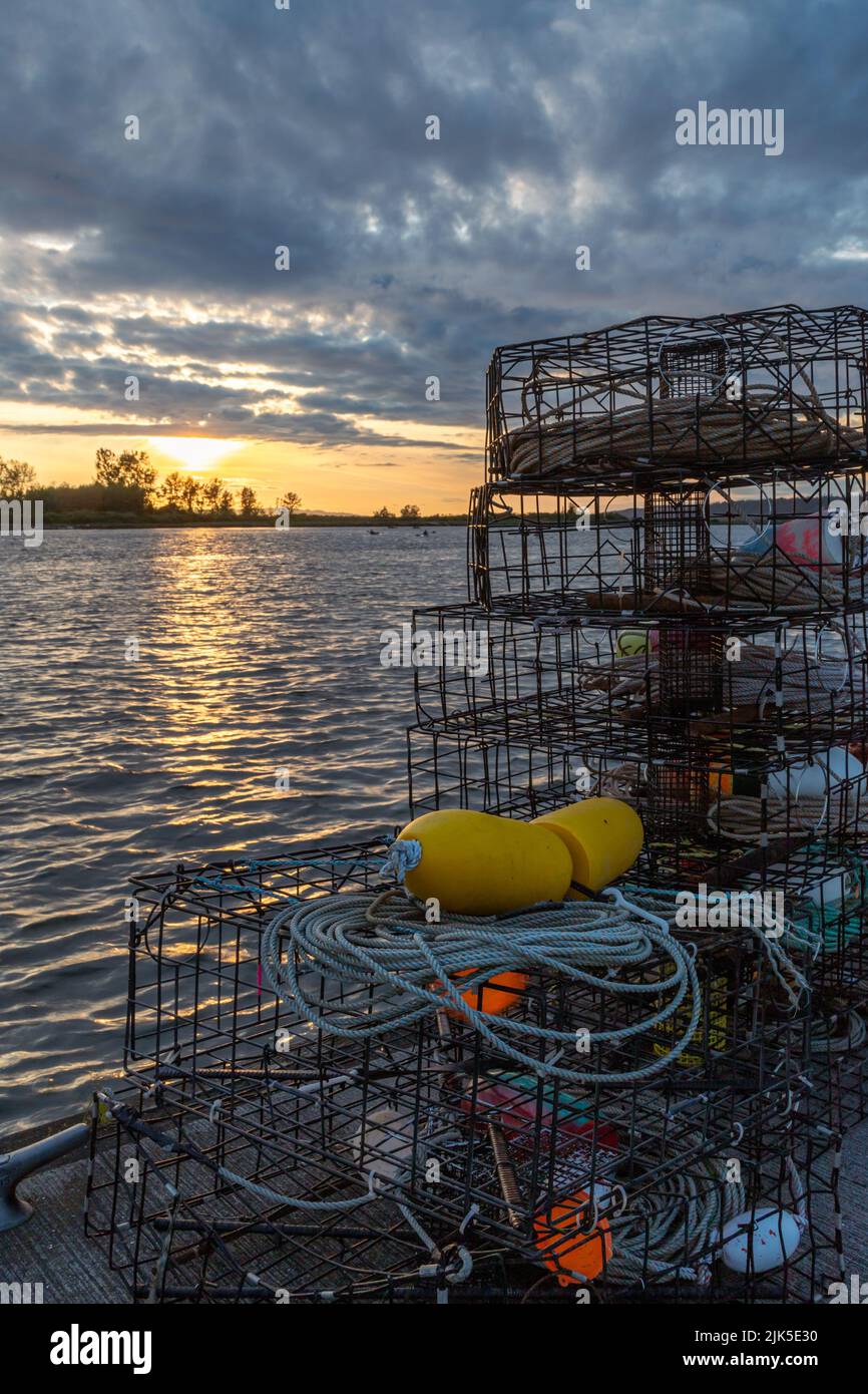 Crab cages on the Everett Marina dock. In background, sunsets over