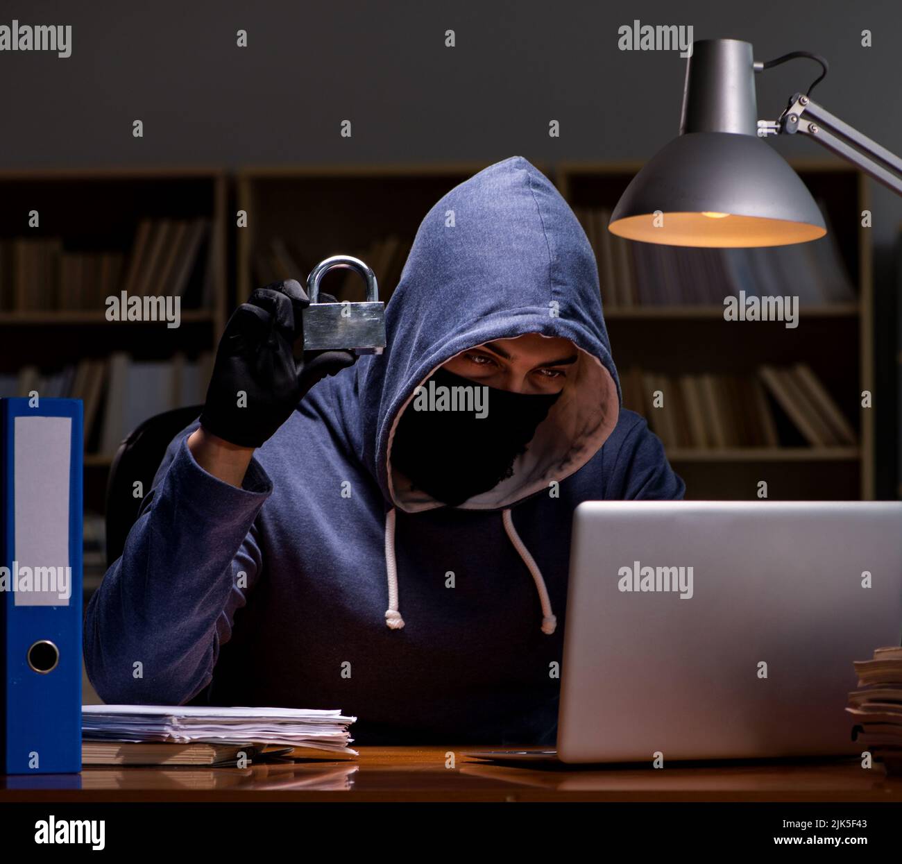 The Hacker Stealing Personal Data From Home Computer Stock Photo - Alamy