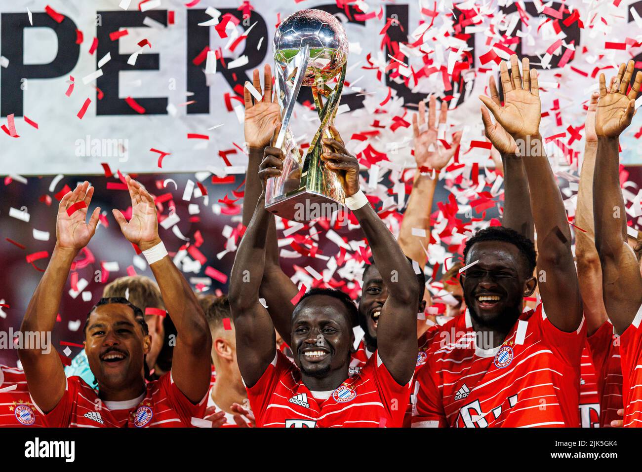 Leipzig, Deutschland. 30th July, 2022. firo : 07/30/2022, football, soccer,  1st league, 1st Bundesliga, season 2022/2023, Supercup Finale Sadio Mane  (FC Bayern Munich) with DFL-Supercup 2022, trophy laughsd, laughs, award  ceremony, Credit