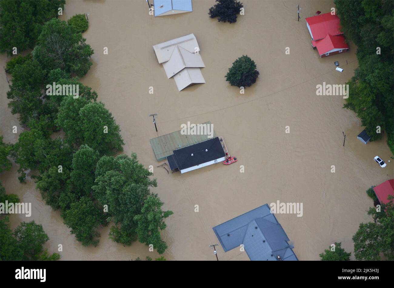 Knott, United States Of America. 29th July, 2022. Knott, United States of America. 29 July, 2022. Aerial view of homes submerged in floodwaters after record rains fell on Eastern Kentucky killing at least 25 people and forcing evacuation of thousands of people, July 29, 2022 in Knott County, Kentucky. Credit: Sgt. Jesse Elbouab/Kentucky National Guard/Alamy Live News Stock Photo