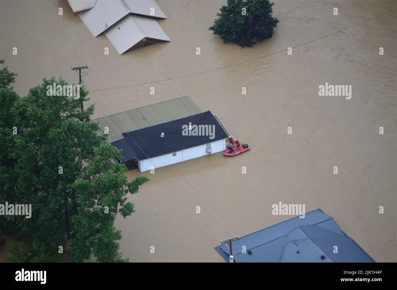 Knott, United States Of America. 29th July, 2022. Knott, United States of America. 29 July, 2022. Aerial view of homes submerged in floodwaters after record rains fell on Eastern Kentucky killing at least 25 people and forcing evacuation of thousands of people, July 29, 2022 in Knott County, Kentucky. Credit: Sgt. Jesse Elbouab/Kentucky National Guard/Alamy Live News Stock Photo