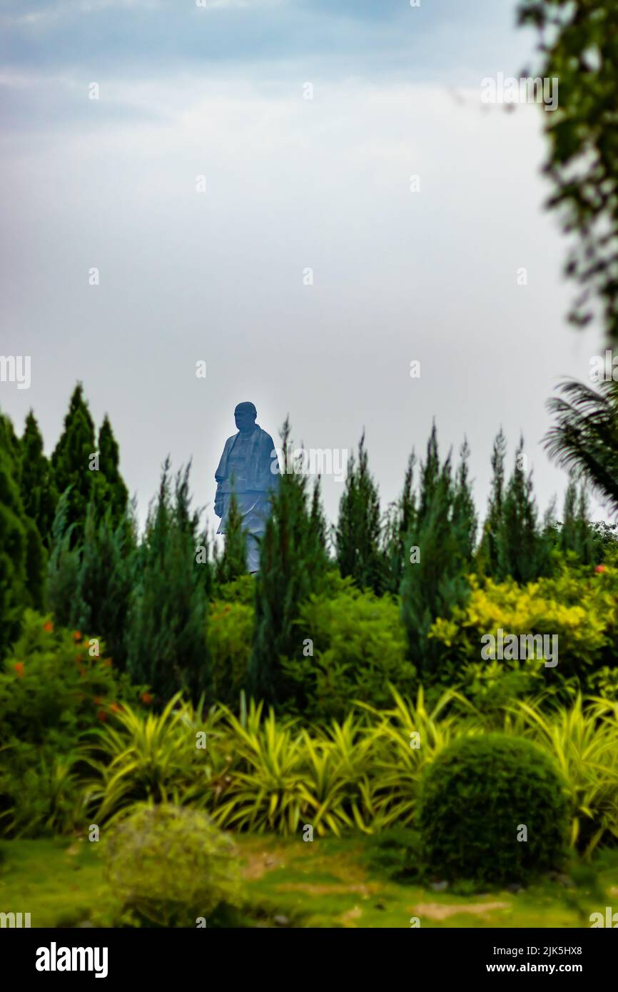 statue of unity the world tallest statue with bright dramatic sky at day from different angle image is taken at vadodra gujrat india on July 10 2022. Stock Photo