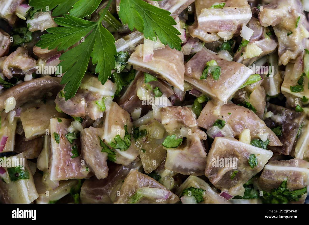 Coriander Pig Ears Salad is a traditional Portuguese (orelhas de porco de coentrada) dish made