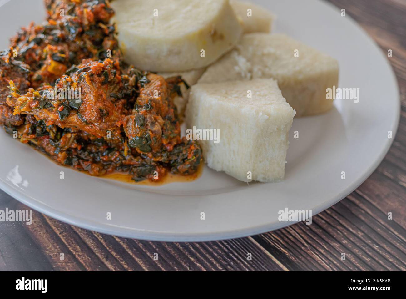 A Plate of boiled yam with spicy Vegetable Stew Stock Photo Alamy