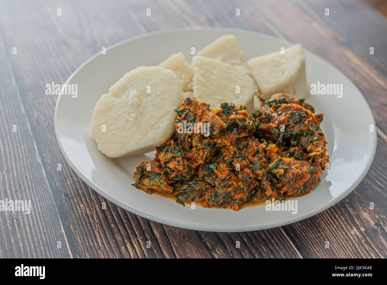 A Plate of boiled yam with spicy Vegetable Stew Stock Photo Alamy