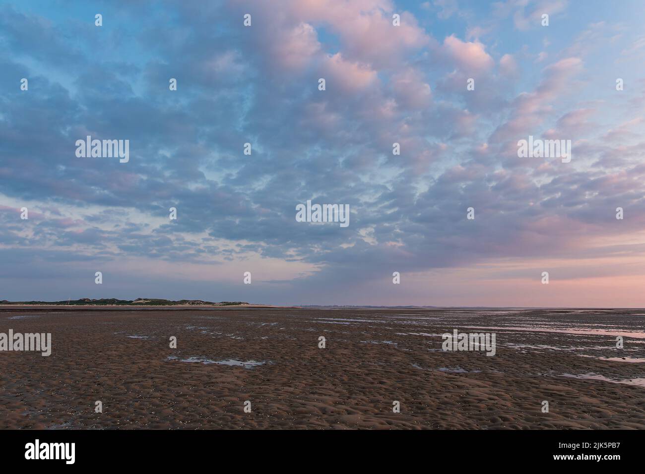 Mud flat in the morning on the island Amrum, Germany. Stock Photo