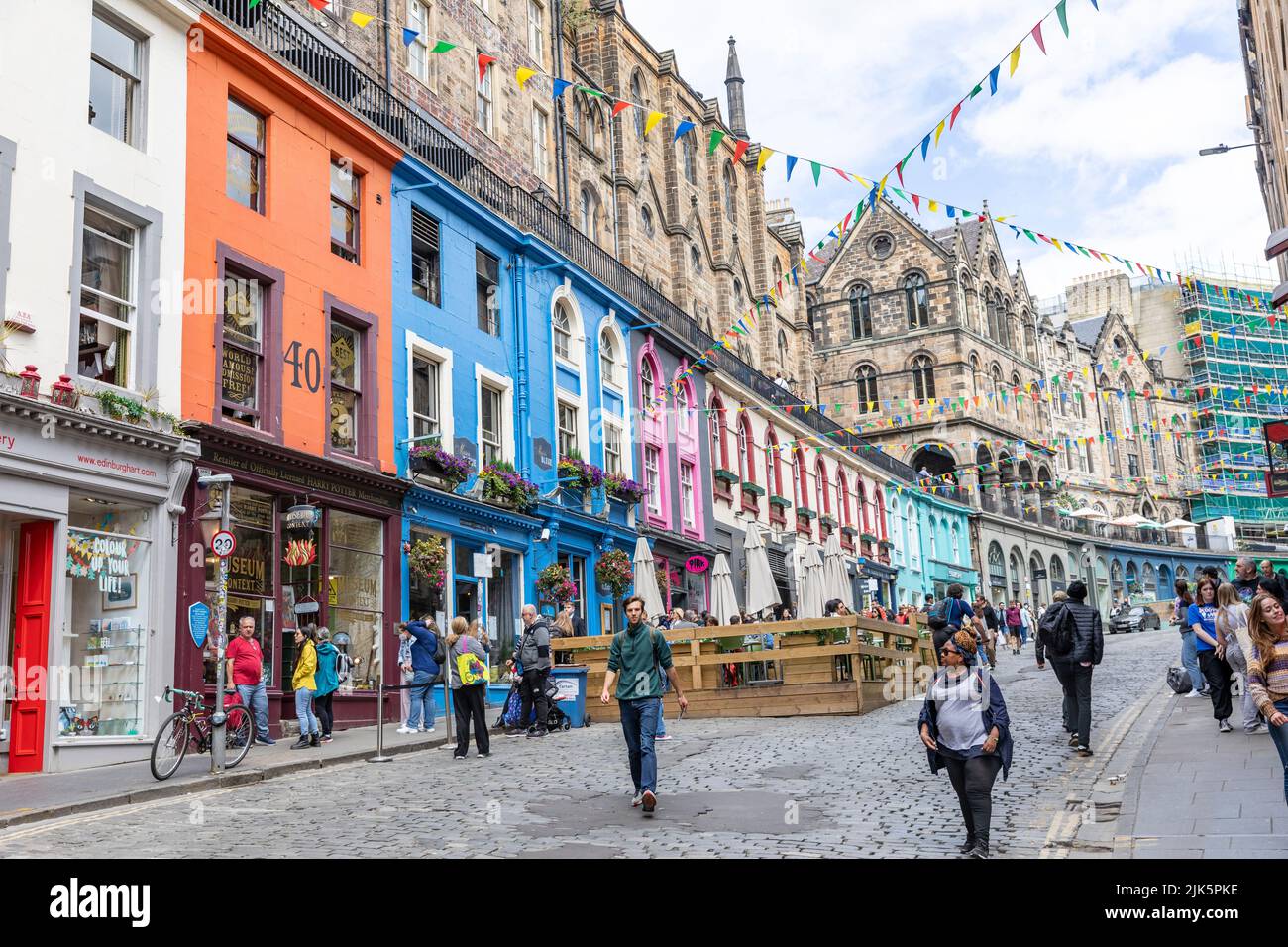 Victoria street Edinburgh old town, brightly coloured shopfronts and independent stores, popular with visitors,Edinburgh, summers day,Scotland,UK Stock Photo