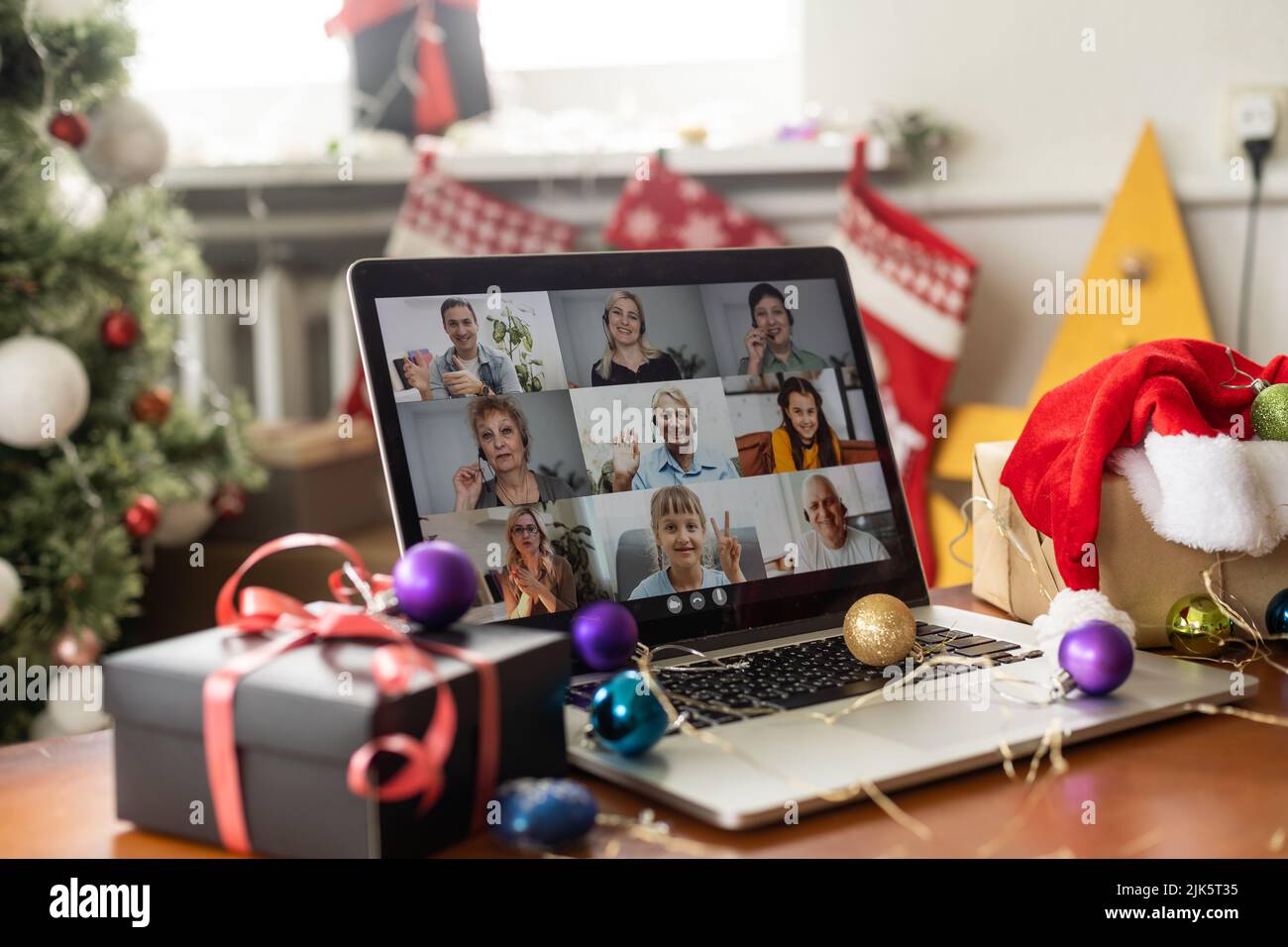 Virtual Christmas tree meeting team teleworking. Family video call
