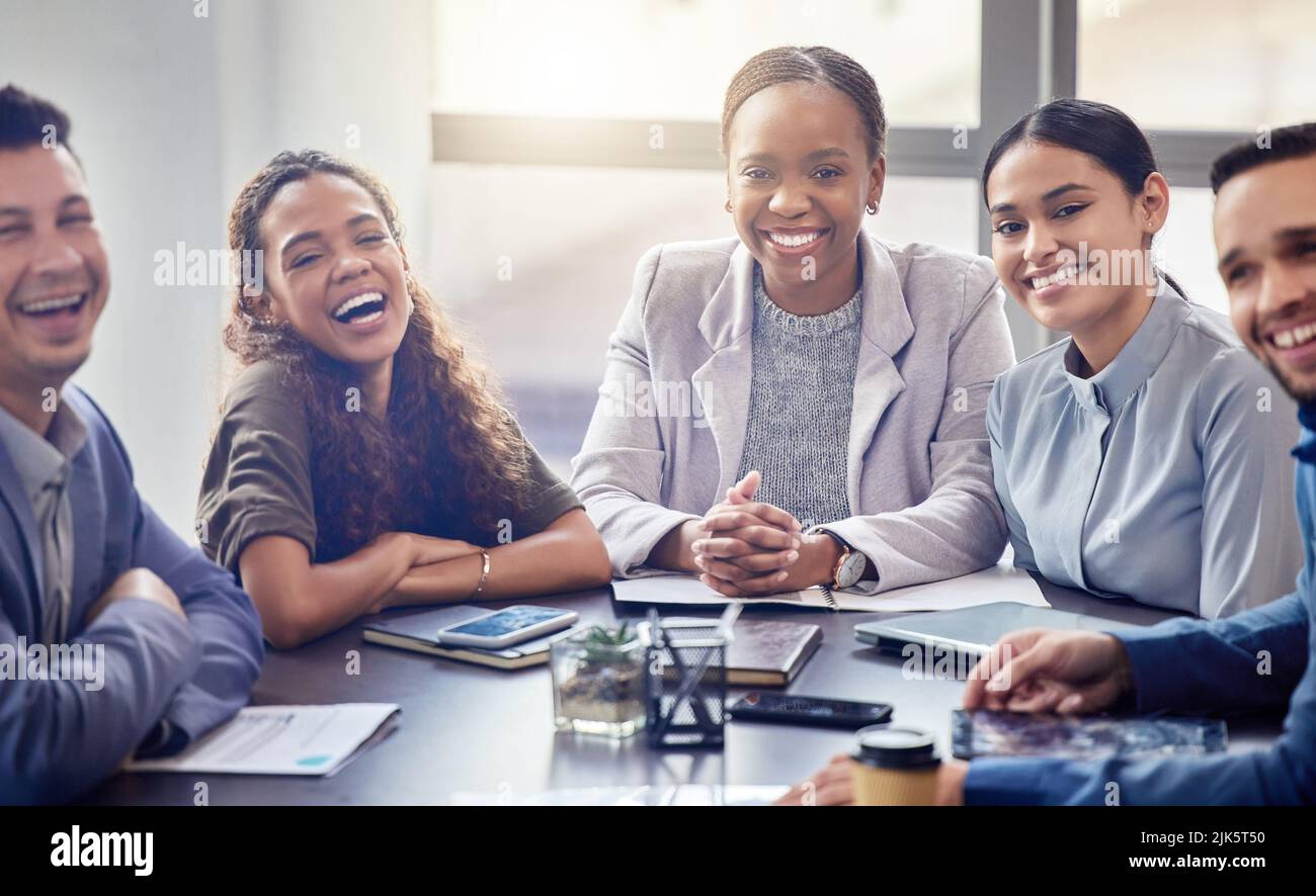 We make a great team a group of colleagues having a meeting in a