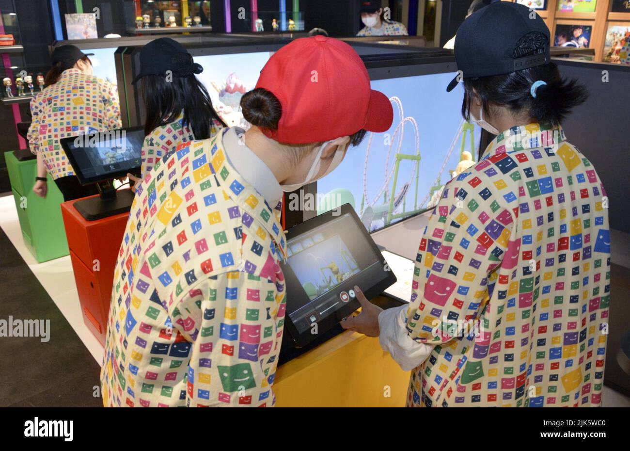 Children learn about making a stop motion animation at the just opened  KidZania Fukuoka, a job role-playing theme park for children, using  real-world tools and equipment, in the southwestern Japan city on