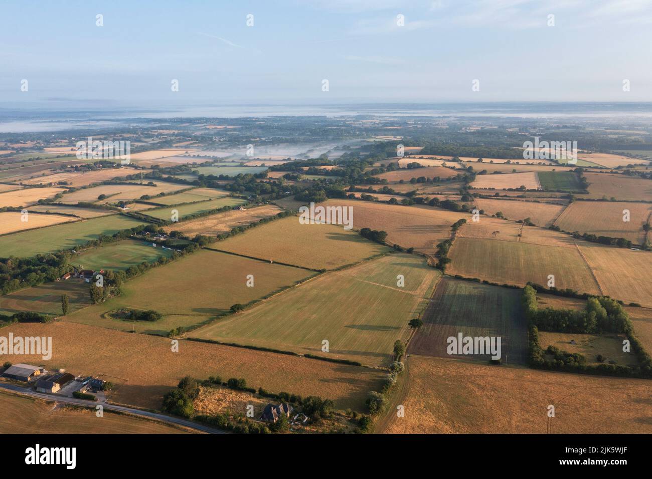 Stunning aerial drone landscape image of South Downs in English countryside on Summer morning Stock Photo