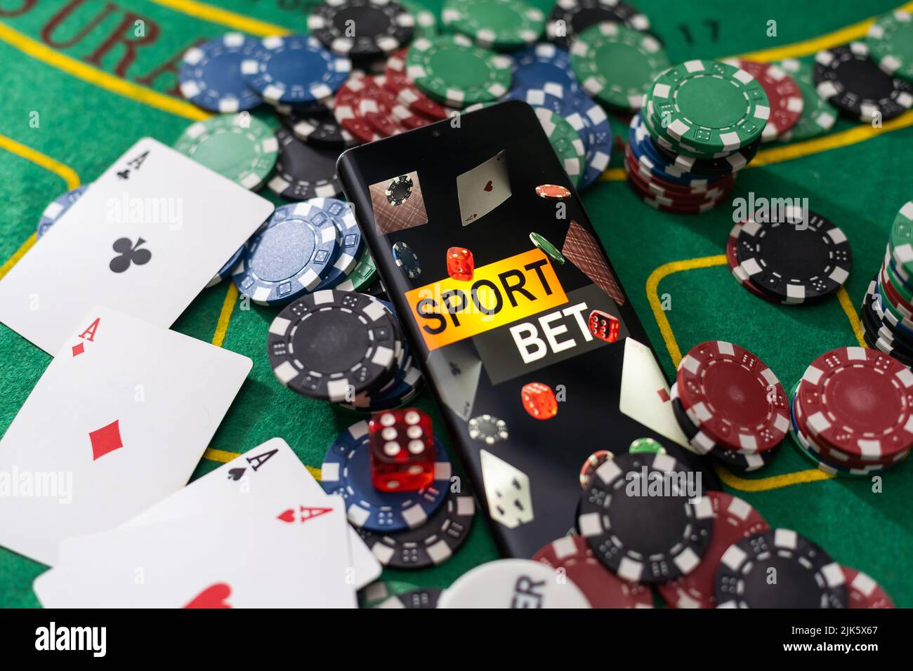 Online poker concept. Smartphone and poker chips on a green background. Poker  online banner. Copy space. Vignette. Place for text. Gambling Stock Photo -  Alamy