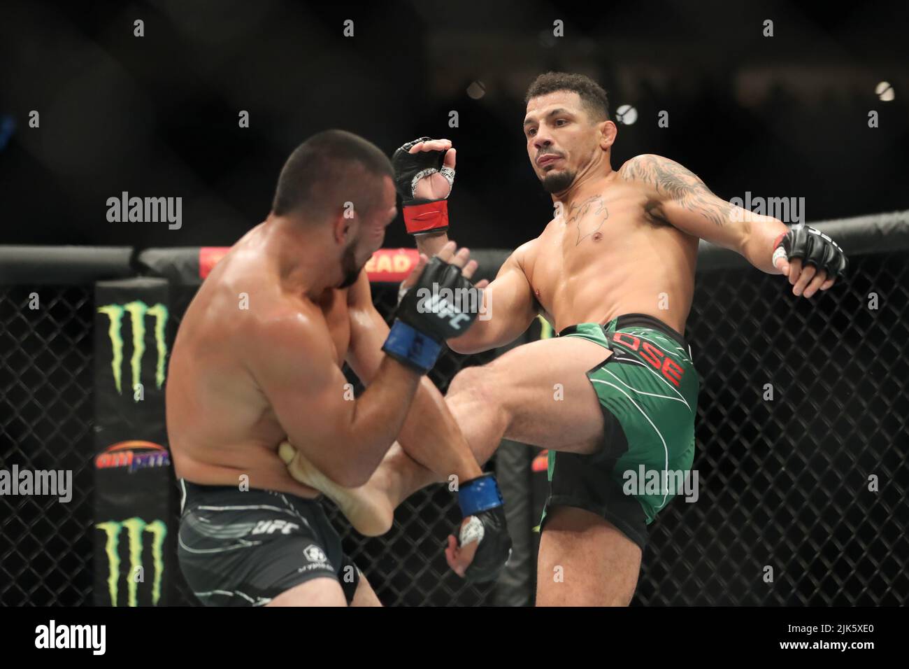 DALLAS, TX - JULY 30: (R-L) Drakkar Klose kicks Rafa Garcia in their Lightweight bout during the UFC 277 event at American Airlines Center on July 30, 2022, in Dallas, Texas, United States. (Photo by Alejandro Salazar/PxImages) Credit: Px Images/Alamy Live News Stock Photo