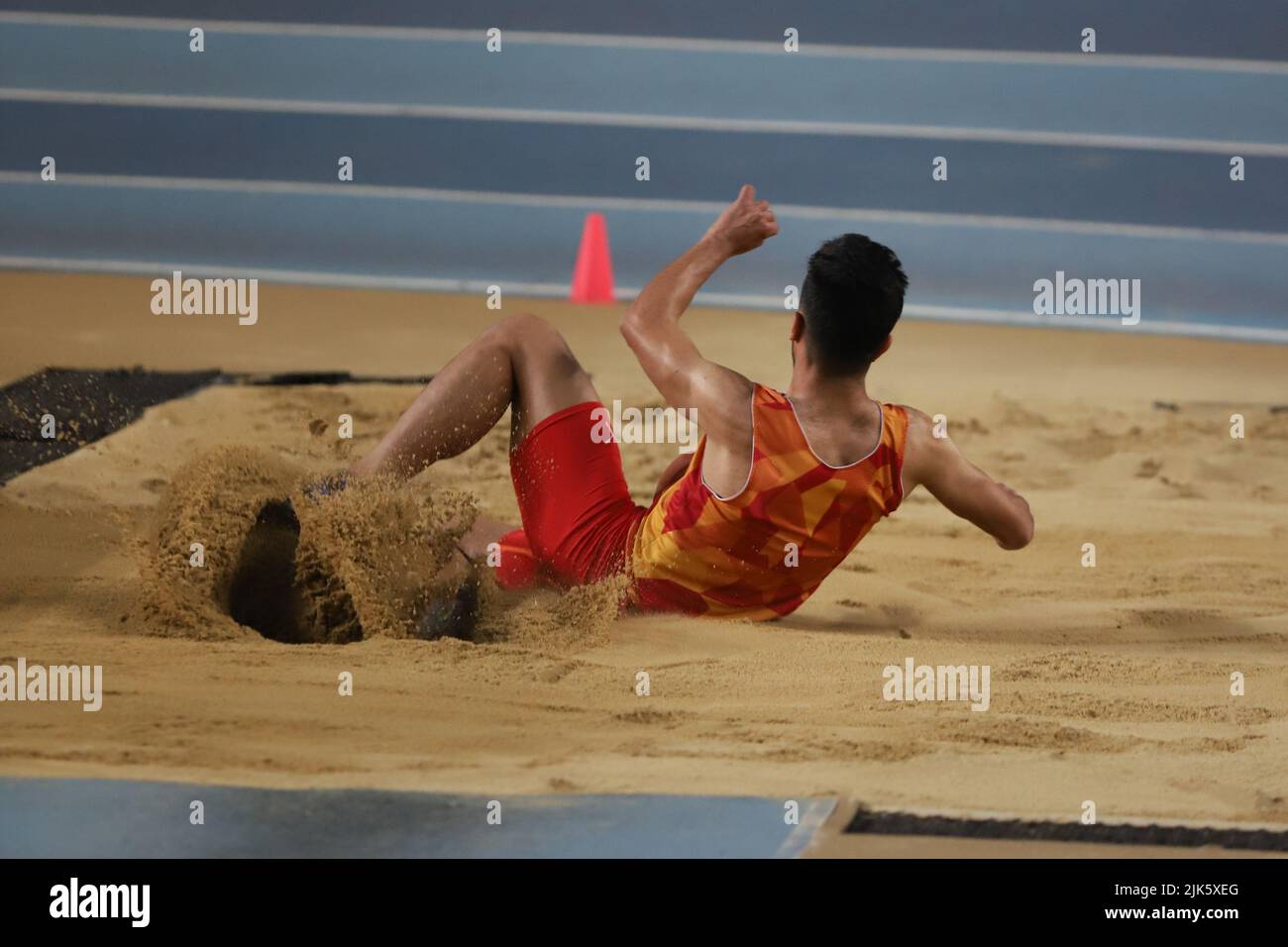 ISTANBUL, TURKEY FEBRUARY 19, 2022 Undefined athlete triple jumping