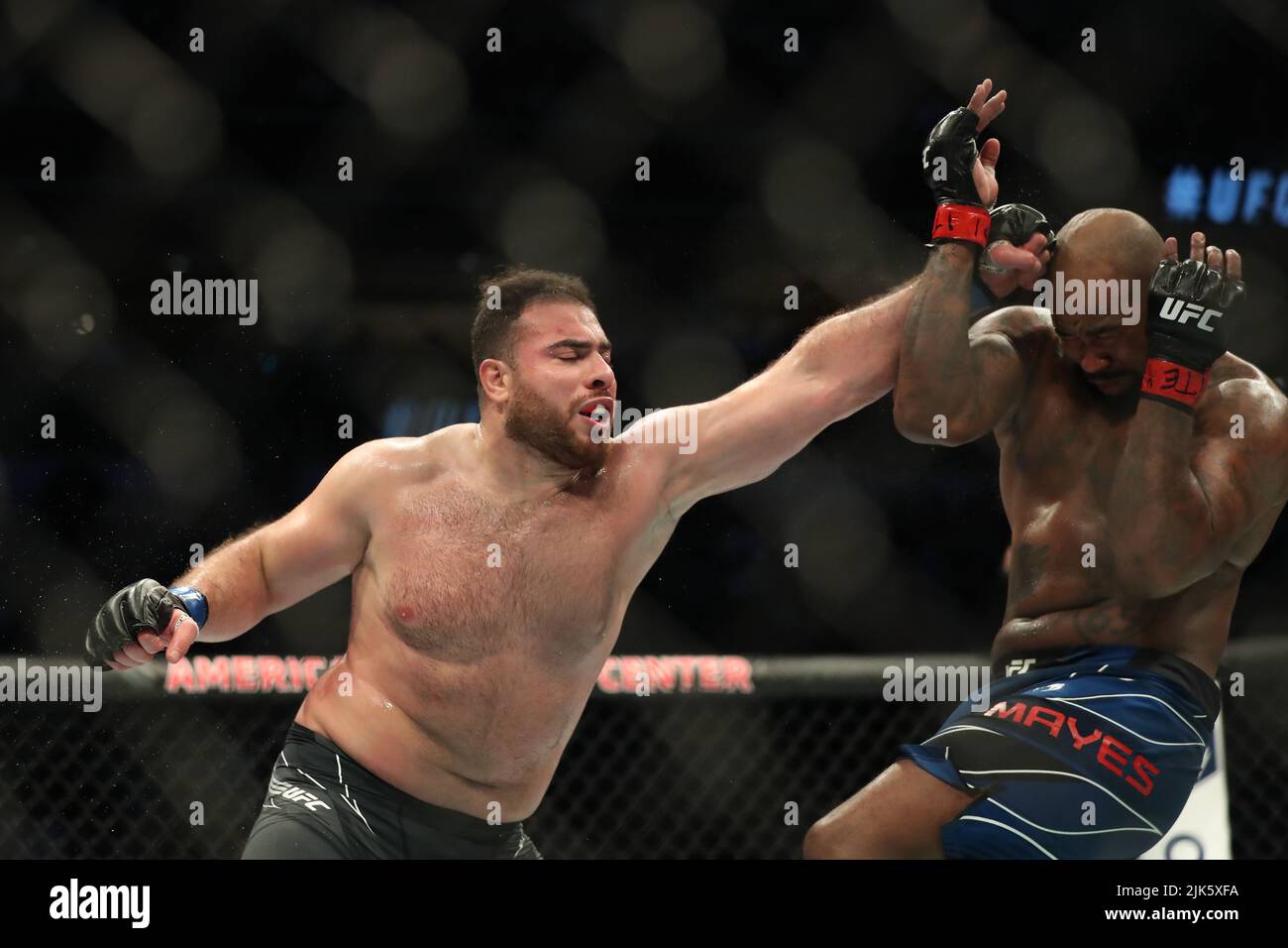 DALLAS, TX - JULY 30: (L-R) Hamdy Abdelwahab punches Don'Tale Mayes in their Heavyweight bout during the UFC 277 event at American Airlines Center on July 30, 2022, in Dallas, Texas, United States. (Photo by Alejandro Salazar/PxImages) Credit: Px Images/Alamy Live News Stock Photo